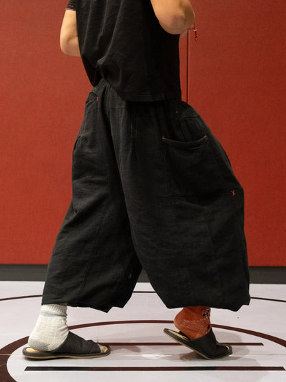 16-PANEL FLAX PLEATED WIDE-LEG PANTS | WASHED BLACK
